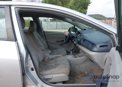 2010 Honda Insight Ex z USA, uszkodzony, nr VIN JHMZE2H7XAS005331